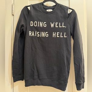 Zoe Karssen “Doing Well Raising Hell” cold shoulder sweatshirt
